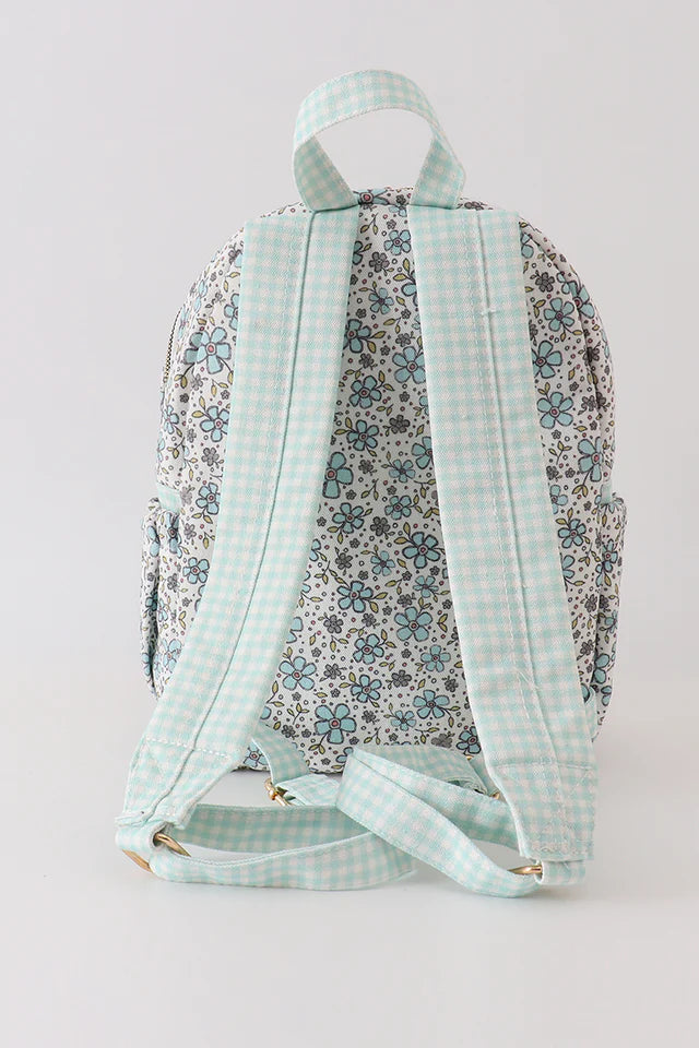 green/blue floral ruffle backpack