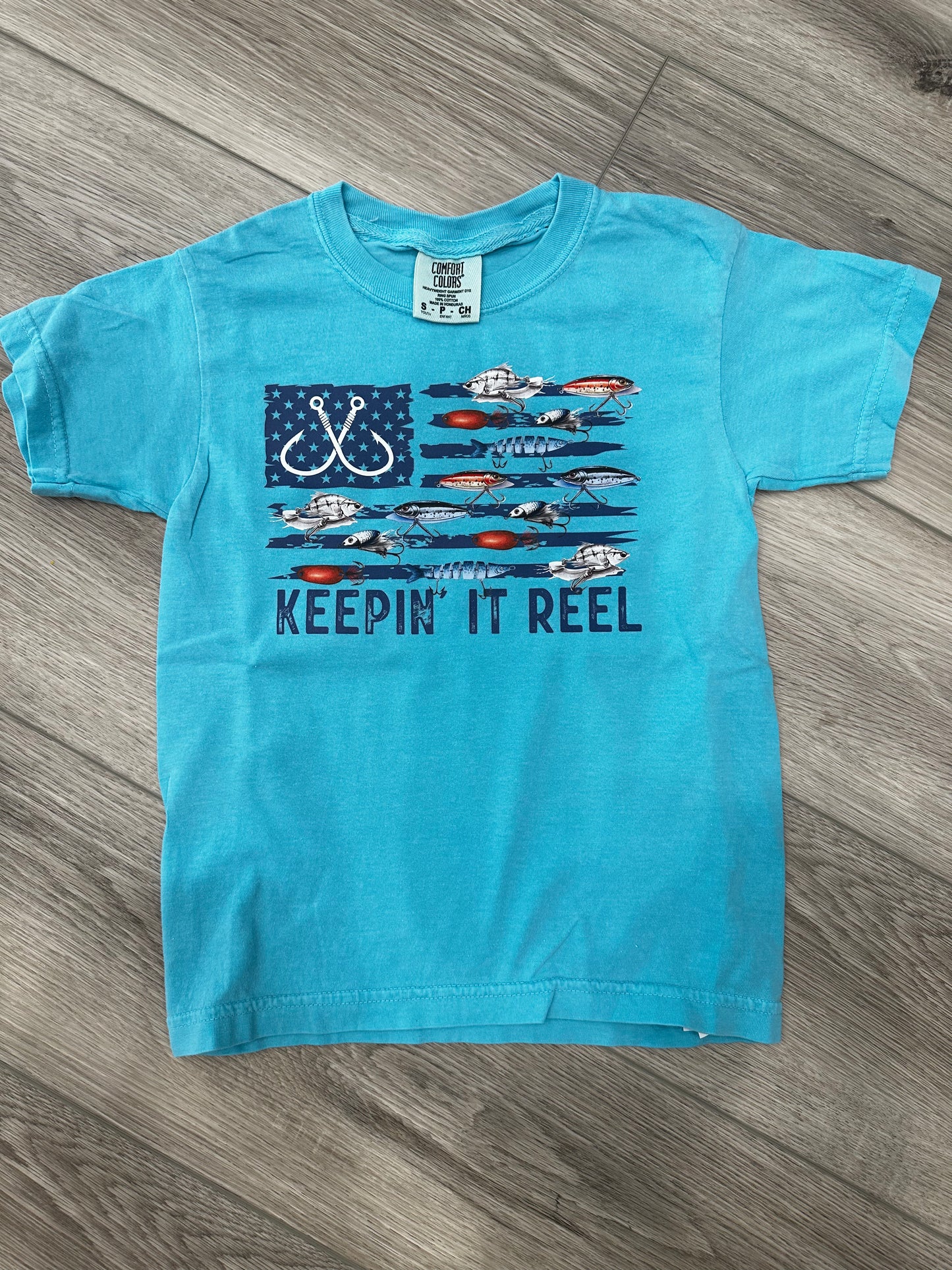 keepin' it reel graphic tee