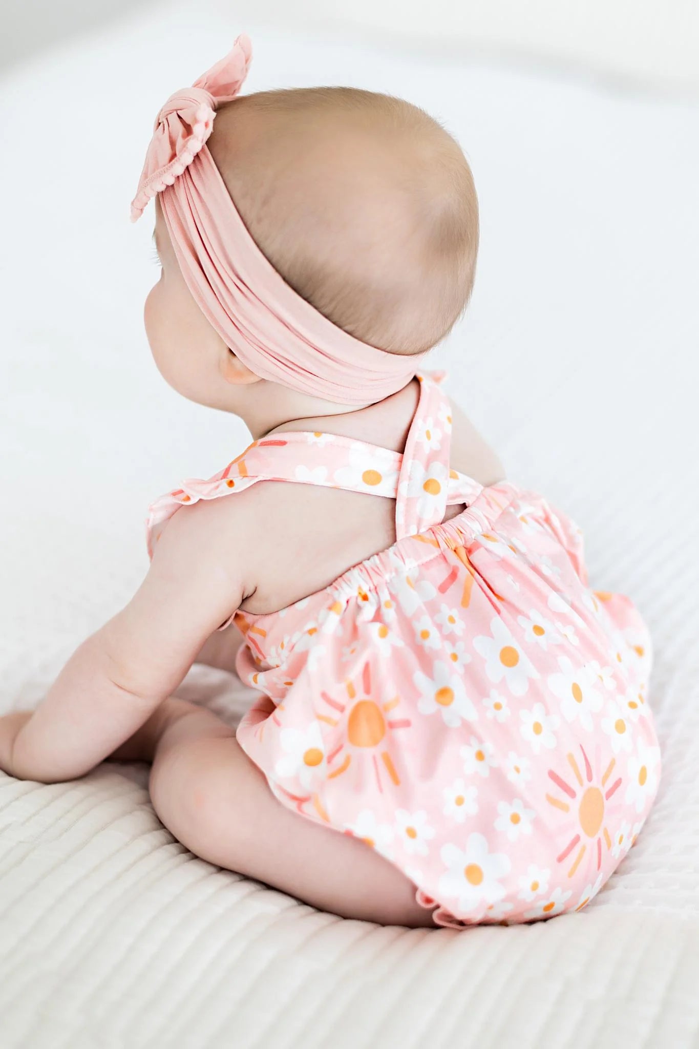 ruffle cross back romper- sweet and sunny